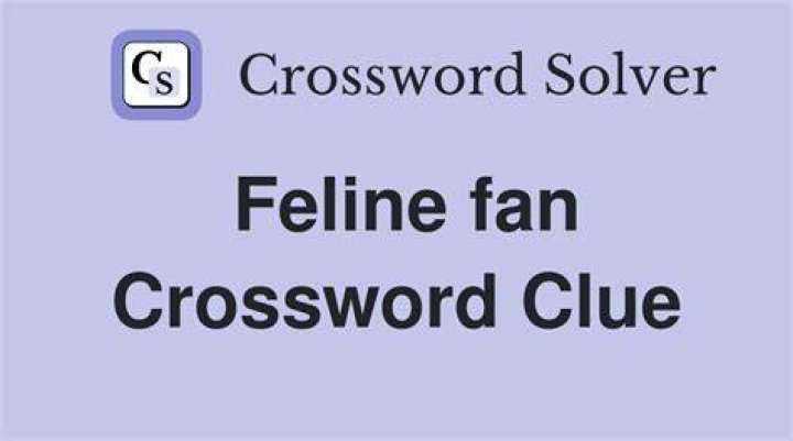 A fan (of) Crossword Clue