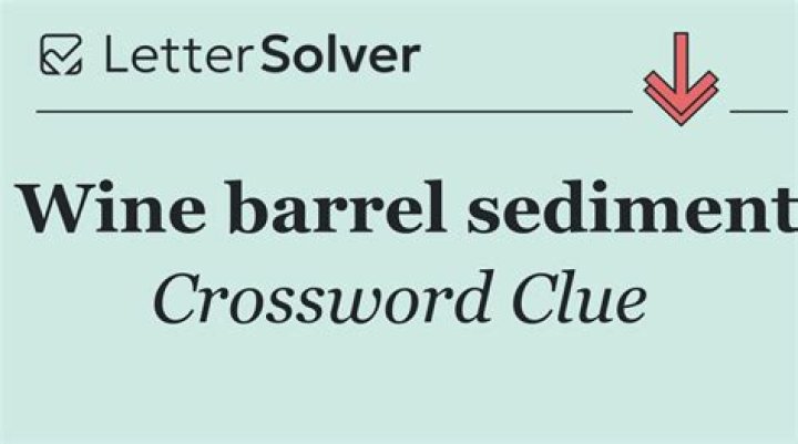 Barrel-flavored, as wine Crossword Clue