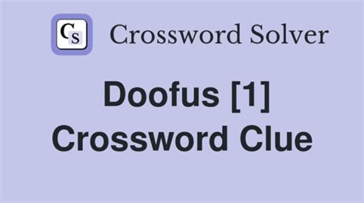 Doofus Crossword Clue