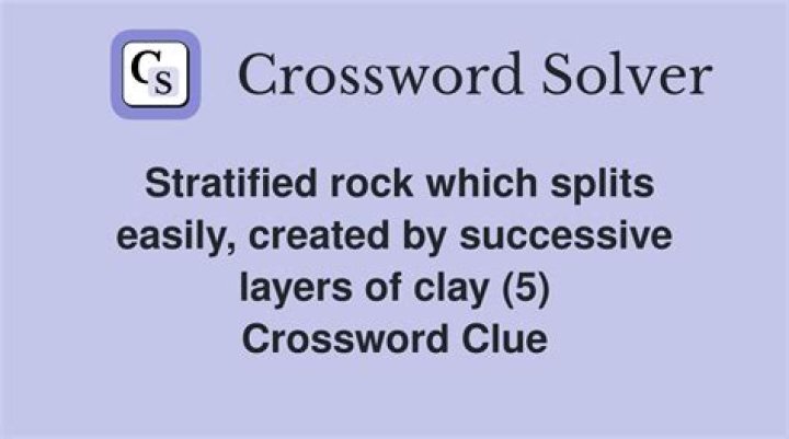 Easily split rock Crossword Clue