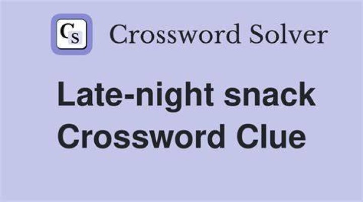Enjoys a late-afternoon snack, as a Brit might Crossword Clue
