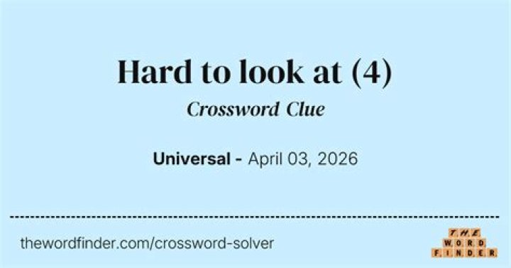 Gets a hard look (at) Crossword Clue