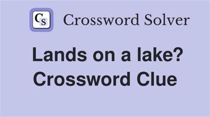 Green lands Crossword Clue