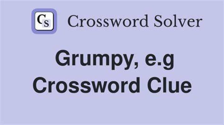 Grumpy co-worker Crossword Clue