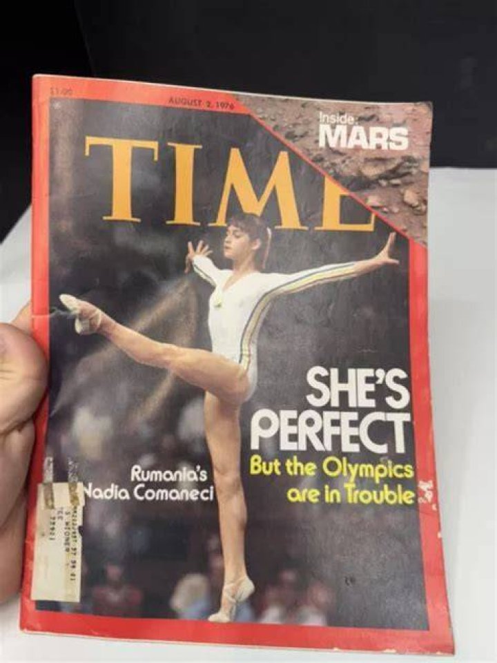 Gymnast on Time’s August 2, 1976, cover with the headline “She’s perfect” Crossword Clue