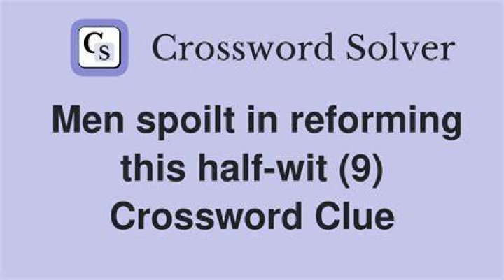 Half-wit Crossword Clue
