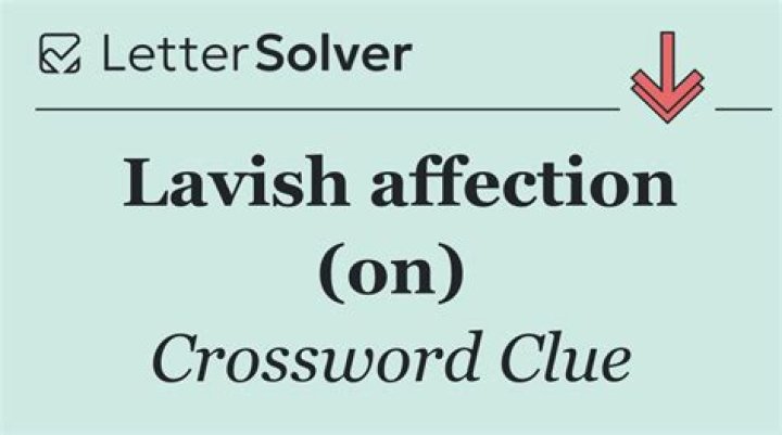 Lavish affection (on) Crossword Clue