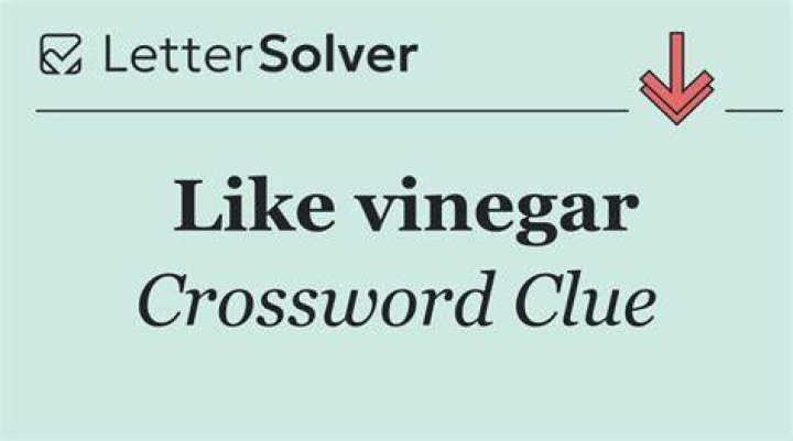 Like vinegar Crossword Clue