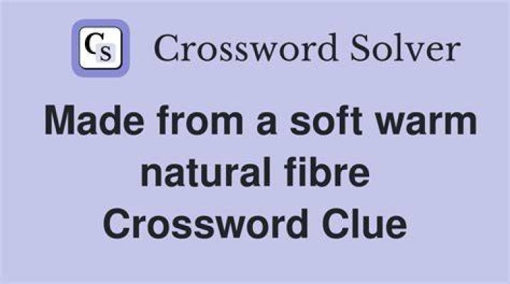Mat made of soft rush Crossword Clue