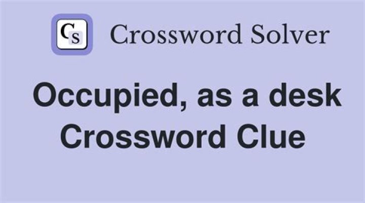 Occupied, as a table Crossword Clue