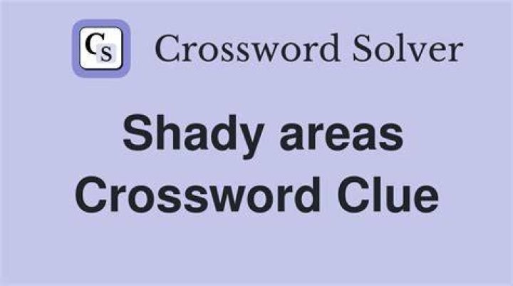 Shady area Crossword Clue