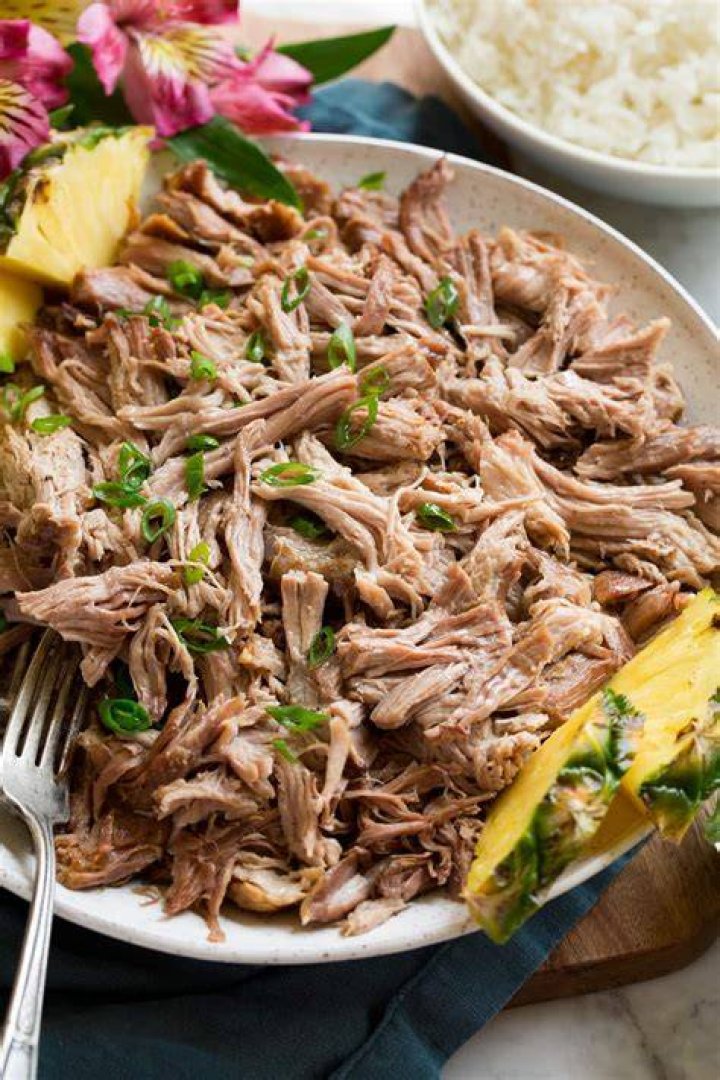 Side dish with kalua pig Crossword Clue