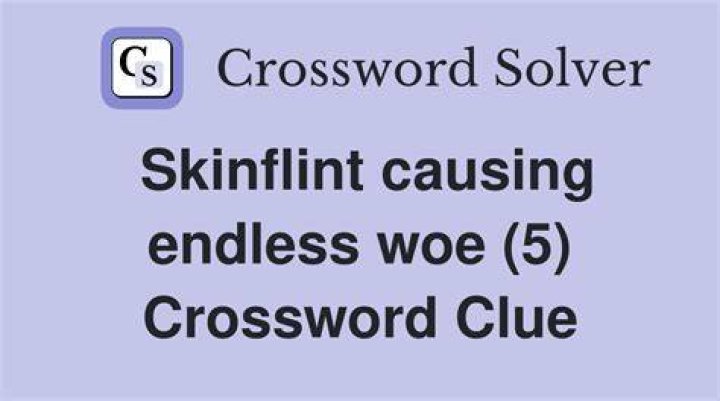 Skinflint Crossword Clue