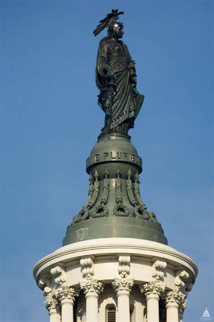 Statue of ___, figure atop the U.S. Capitol Crossword Clue