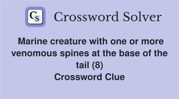 Venomous predator with a vibrating tail Crossword Clue