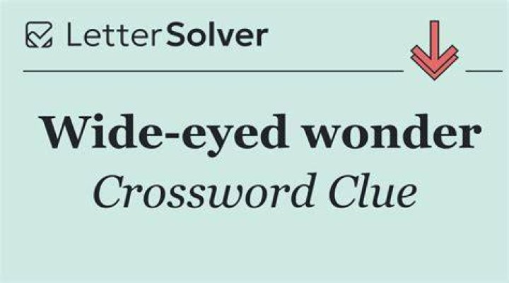 Wide-eyed in wonder Crossword Clue