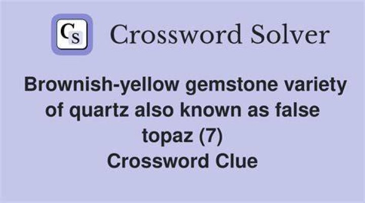 Yellow variety of quartz Crossword Clue